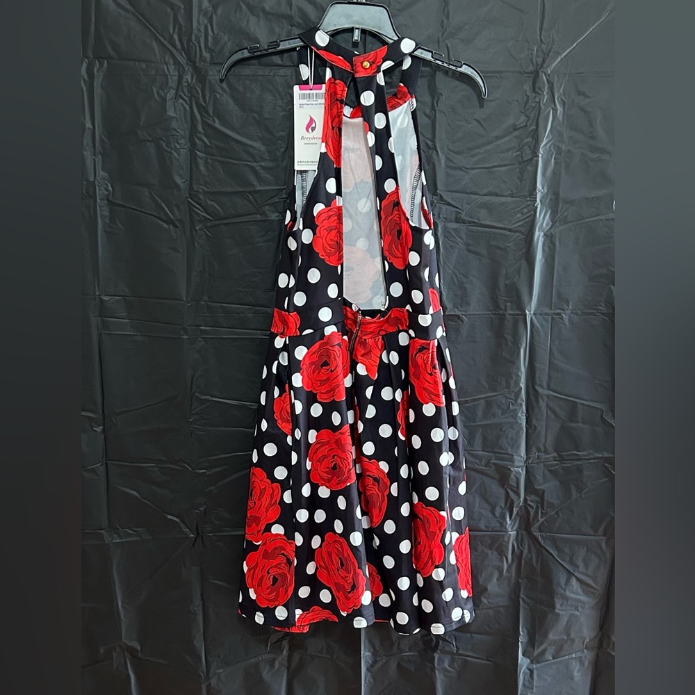A new Red/black/white rose dress by Berydress in a woman’s small